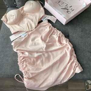I’m selling a two piece satin set from Oh Polly, it’s blush colored. Size 4